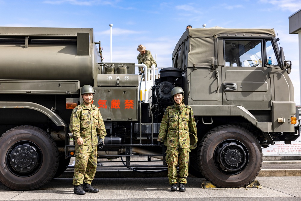 NMCB 4 and JGSDF refuel generators during Active Shield 26 NMCB 4 and JGSDF refuel generators during Active Shield 26
