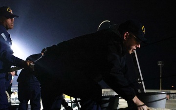 USS Paul Ignatius (DDG 117) conducts a sea-and-anchor evolution to pull into port