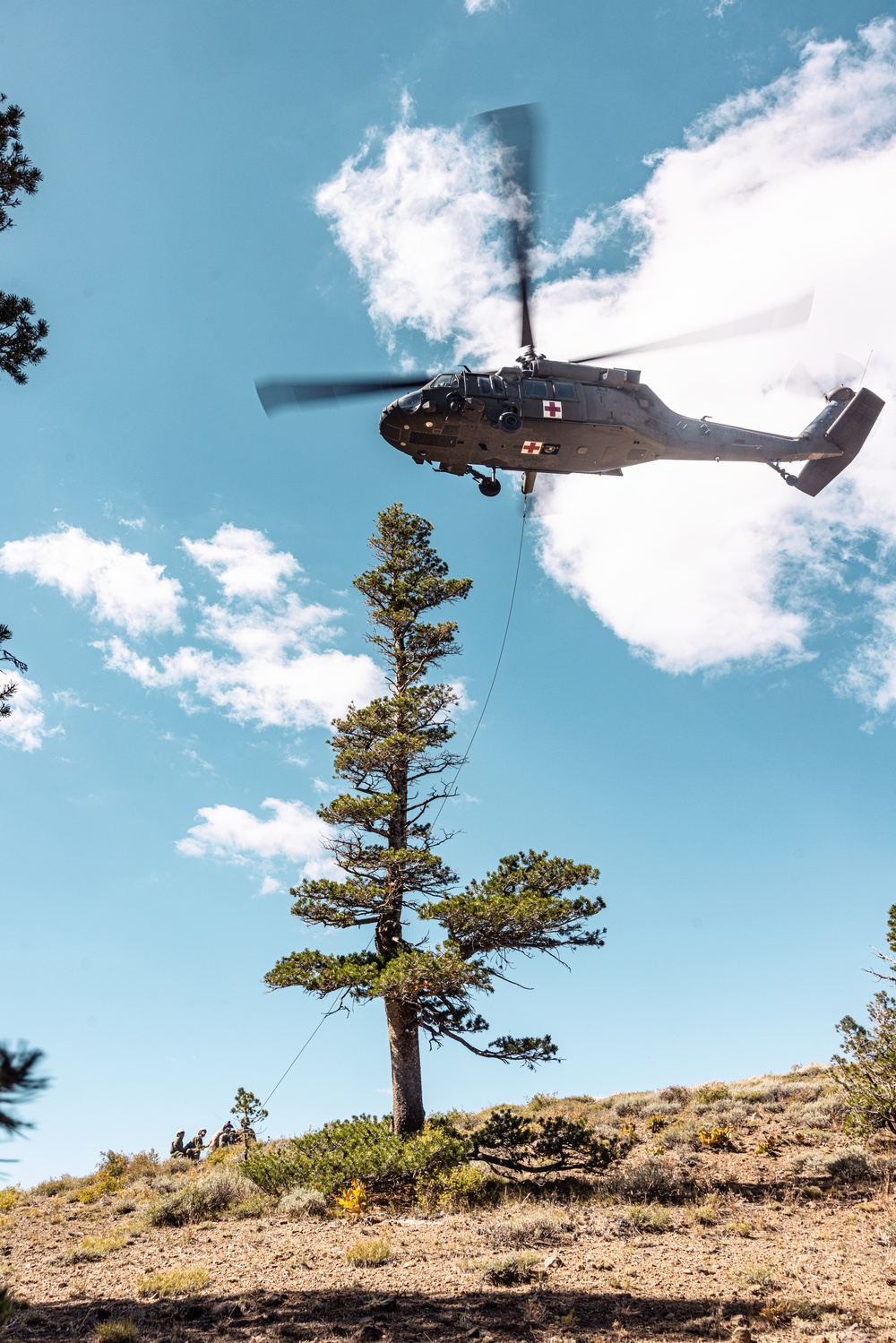 U.S. service members conduct CASEVAC during Mountain Medicine 3-25 final exercise