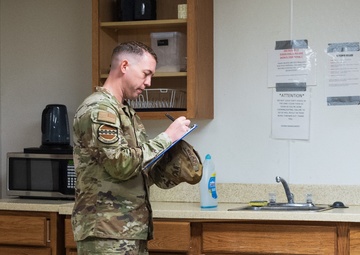 Holloman command teams perform 100% dorm inspections