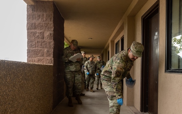 Holloman command teams perform 100% dorm inspections