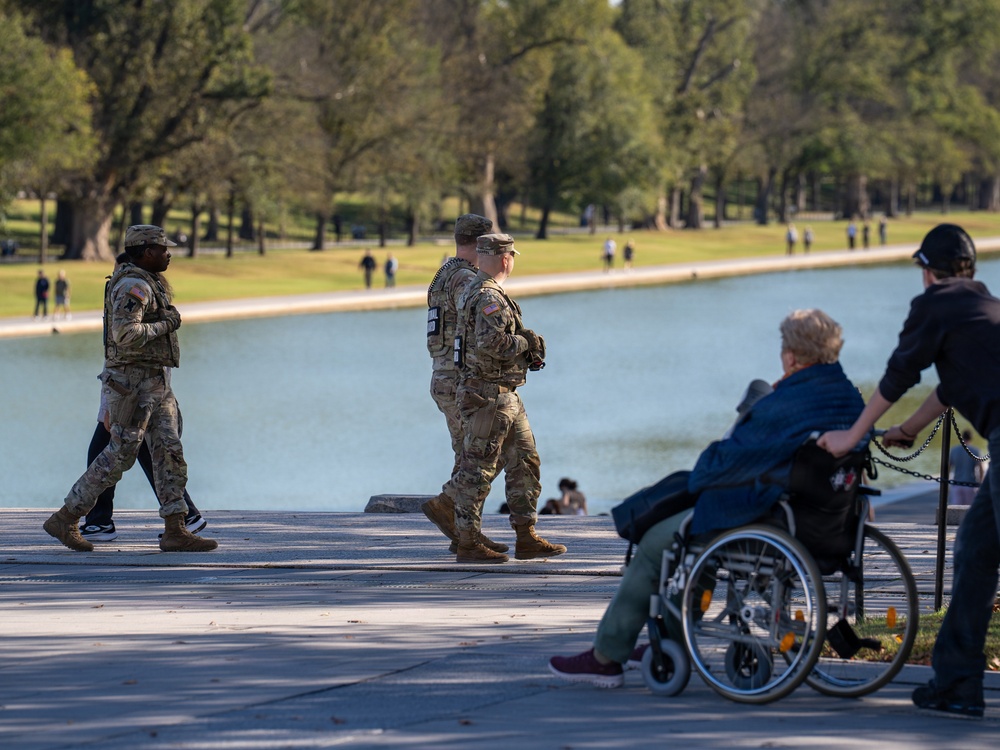 Soldiers provide a presence patrol in the National Mall Soldiers provide a presence patrol in the National Mall