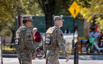 Soldiers provide a presence patrol in the National Mall