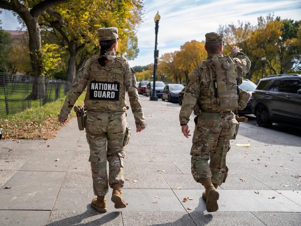 Soldiers provide a presence patrol in the National Mall Soldiers provide a presence patrol in the National Mall