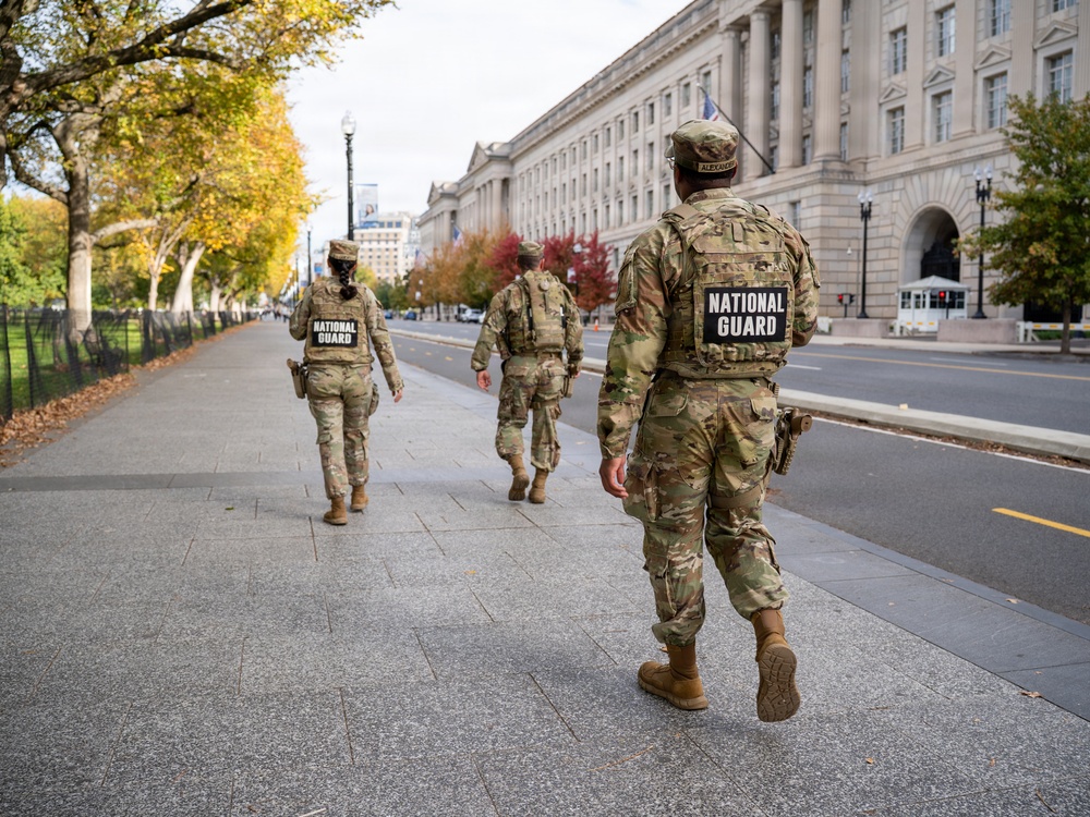 Soldiers provide a presence patrol in the National Mall Soldiers provide a presence patrol in the National Mall