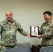 1st Signal Brigade Presents Plaque of Appreciation to Sgt. Shin Woo Kim Health Clinic