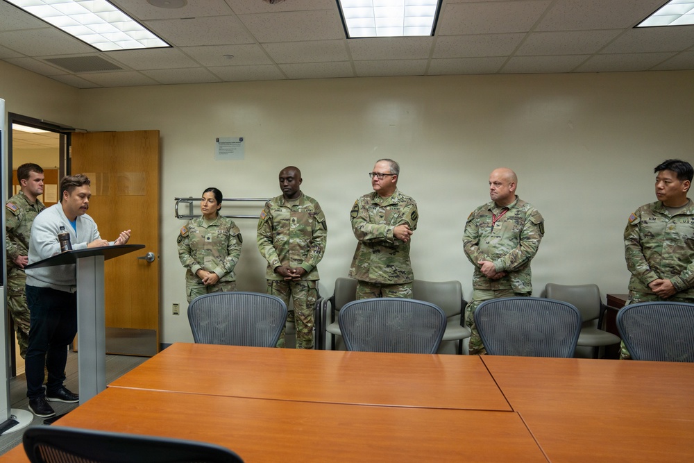 1st Signal Brigade Presents Plaque of Appreciation to Sgt. Shin Woo Kim Health Clinic