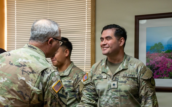 1st Signal Brigade Presents Plaque of Appreciation to Sgt. Shin Woo Kim Health Clinic