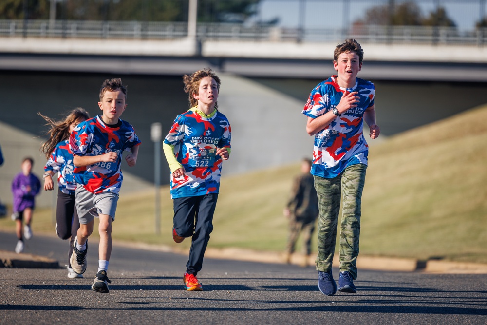 Children race in MCM Kids run before 50th MCM