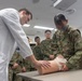 NMTRU teach JGSDF and JMSDF Tactical Combat Casualty Care