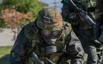 U.S. Marines and JGSDF members respond to a simulated CBRN attack during exercise Active Shield 26