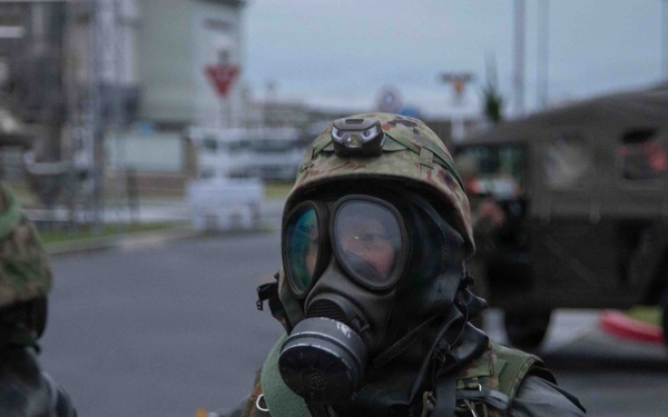 U.S. Marines and JGSDF members respond to a simulated CBRN attack during exercise Active Shield 26