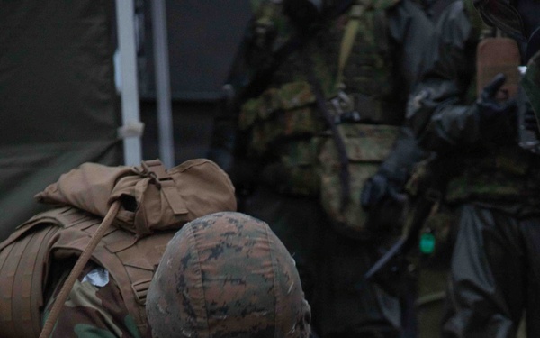 U.S. Marines and JGSDF members respond to a simulated CBRN attack during exercise Active Shield 26