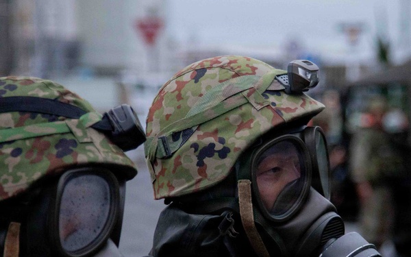 U.S. Marines and JGSDF members respond to a simulated CBRN attack during exercise Active Shield 26