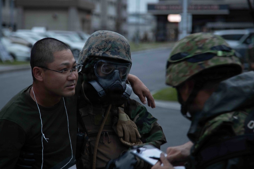 U.S. Marines and JGSDF members respond to a simulated CBRN attack during exercise Active Shield 26 U.S. Marines and JGSDF members respond to a simulated CBRN attack during exercise Active Shield 26