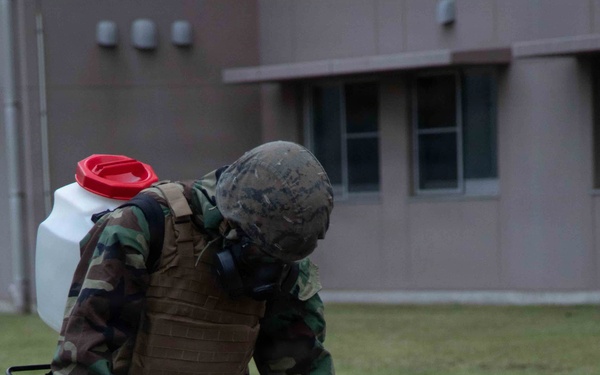U.S. Marines and JGSDF members respond to a simulated CBRN attack during exercise Active Shield 26