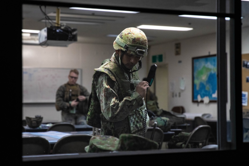 U.S. Marines and JGSDF members participate in simulated CBRN casualty care during exercise Active Shield 26