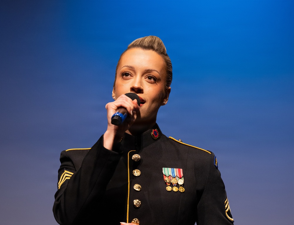 Staff Sgt. Madison Baldwin performing "Defying Gravity." Staff Sgt. Madison Baldwin performing "Defying Gravity."