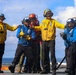USS Iwo Jima Sailors and U.S. Marines Conduct An Aviation Training Team Drill on the Flight Deck