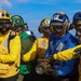 USS Iwo Jima Sailors and U.S. Marines Conduct An Aviation Training Team Drill on the Flight Deck