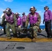 USS Iwo Jima Sailors and U.S. Marines Conduct An Aviation Training Team Drill on the Flight Deck