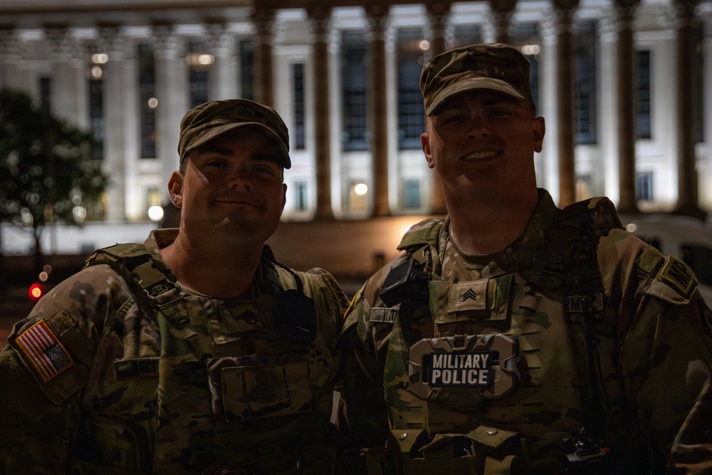 Mississippi Army National Guard Soldiers take a photo at night in Washington, D.C. Mississippi Army National Guard Soldiers take a photo at night in Washington, D.C.