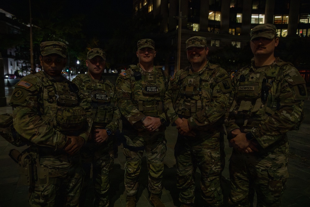 Mississippi Army National Guard Soldiers take a photo at night in Washington, D.C. Mississippi Army National Guard Soldiers take a photo at night in Washington, D.C.