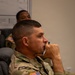 Command Sgt. Maj. Larry Primeaux in a meeting at the George Washington University Police Department