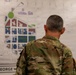 Maj. Robert Gray looks at a map of the George Washington University campus