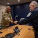 Lt. Col. Steven Jackson, MSNG, gives a unit patch to George Washington University Police Chief, Victor Brito