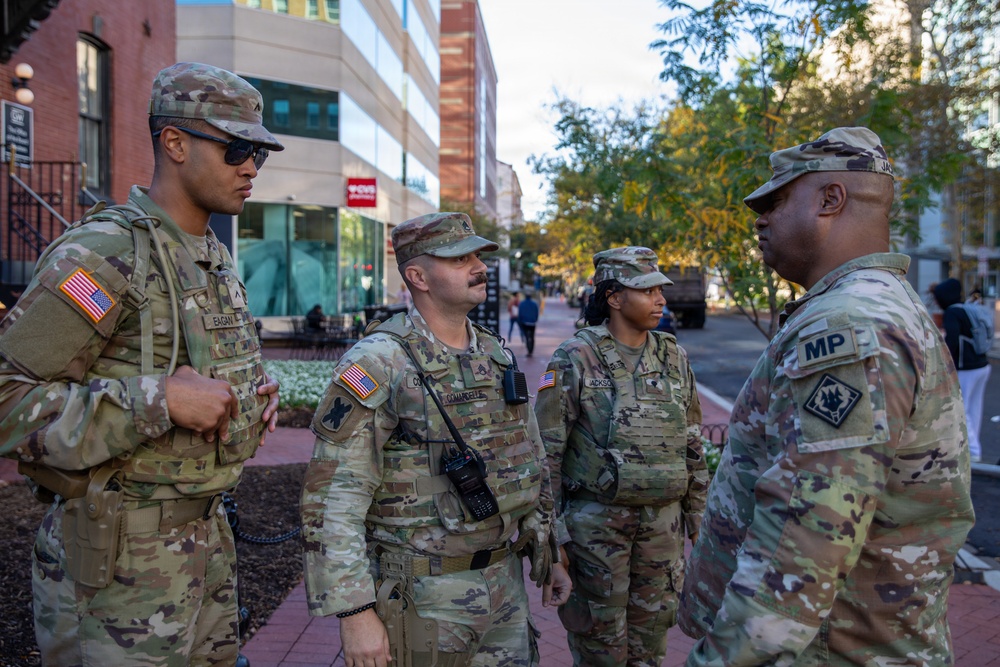 Lt. Col. Steven Jackson meets with Soldiers on patrol at George Washington University Lt. Col. Steven Jackson meets with Soldiers on patrol at George Washington University
