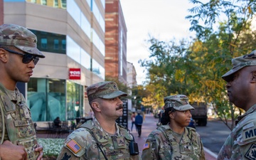 Lt. Col. Steven Jackson meets with Soldiers on patrol at George Washington University