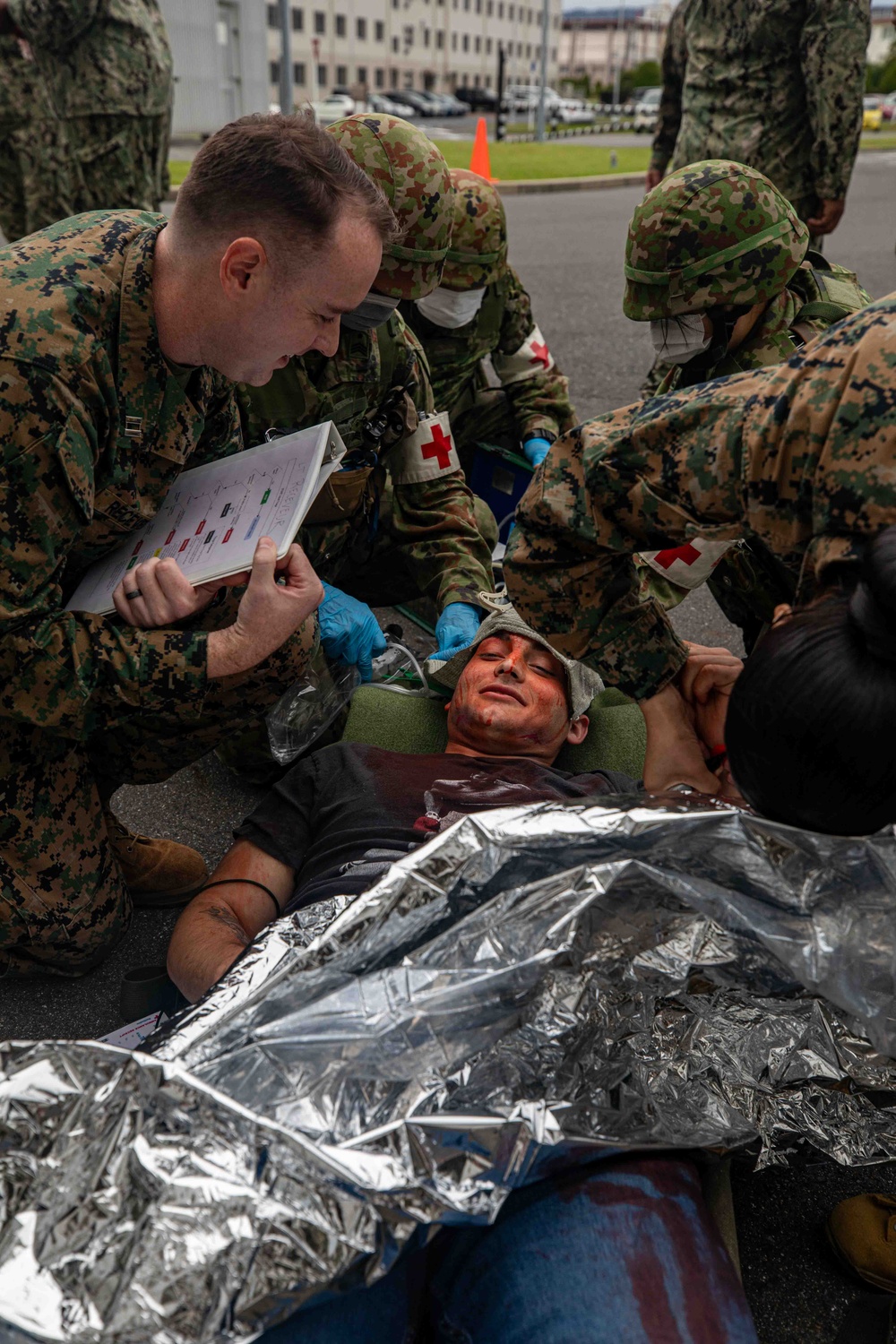 U.S. Navy, JGSDF, and JMSDF members participate in mass casualty training