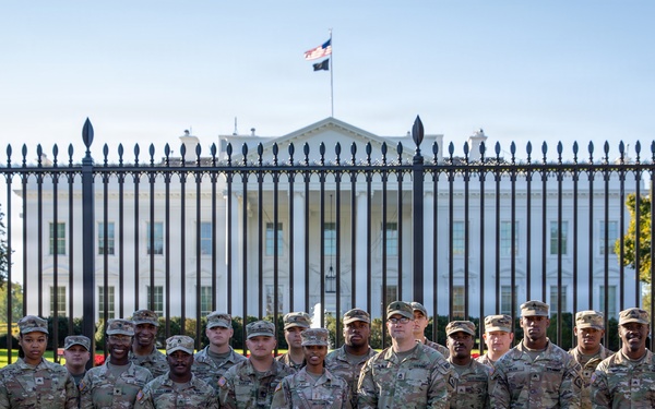 Mississippi National Guard service members take a photo in front of the White House