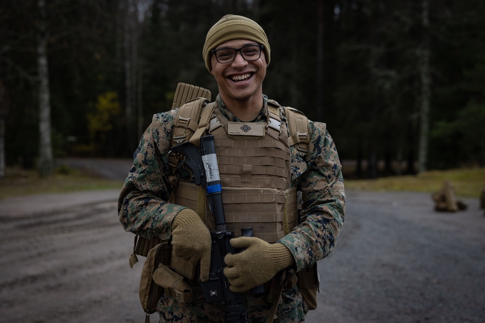 Combat Logistics Battalion 6 Corpsmen pose for photos before a live-fire range