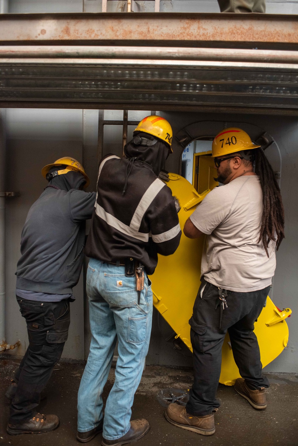 Ronald Reagan Sailors Install Door