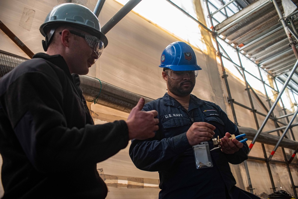 Ronald Reagan Sailors Install Door