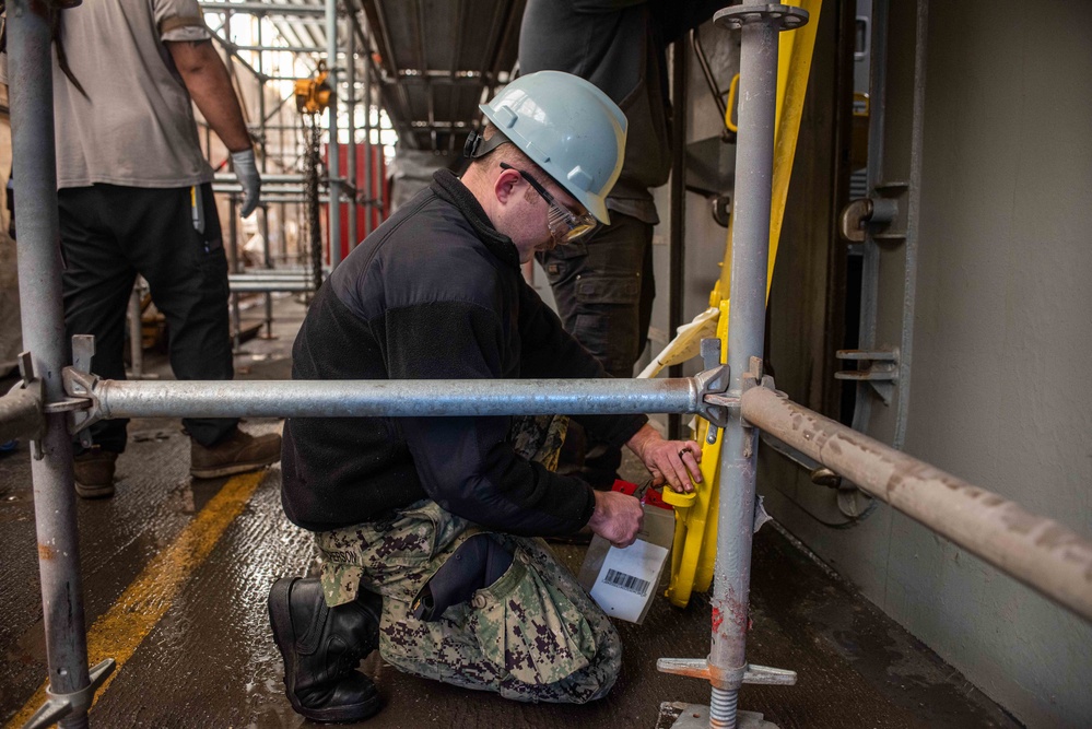 Ronald Reagan Sailors Install Door