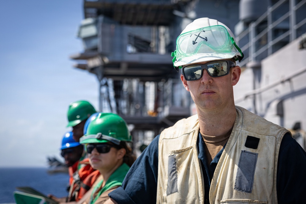USS Iwo Jima Conducts a Replenishment-At-Sea with USNS Joshua Humphreys