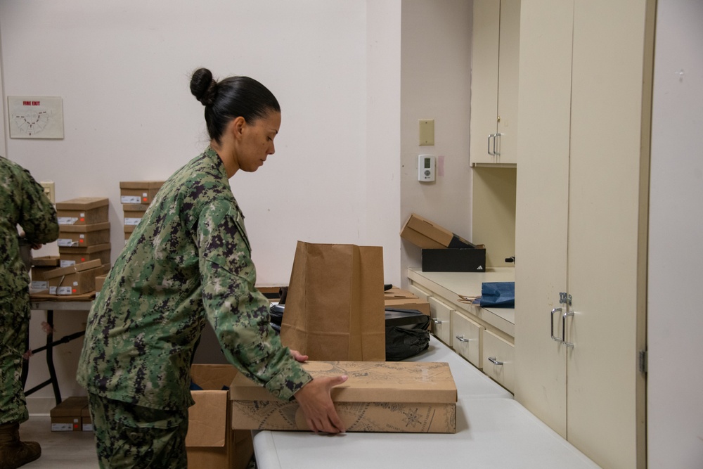 Sailors Utilize Chapel Closet