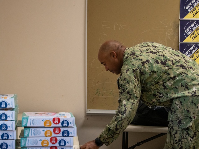 Sailors Utilize Chapel Closet