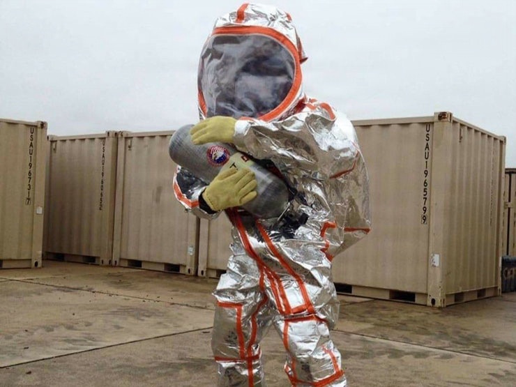 A CBRN Specialist wears a safe suit on a training exercise