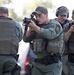 Emergency Response Team members on alert with guns drawn