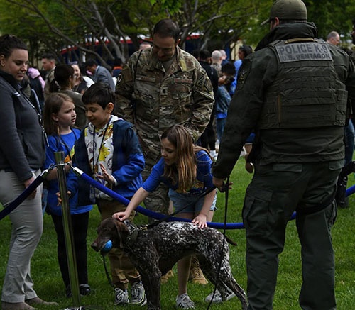 A PFPA K-9 and handler at a job fair