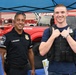 A Pentagon police officer talks with a job seeker at a job fair