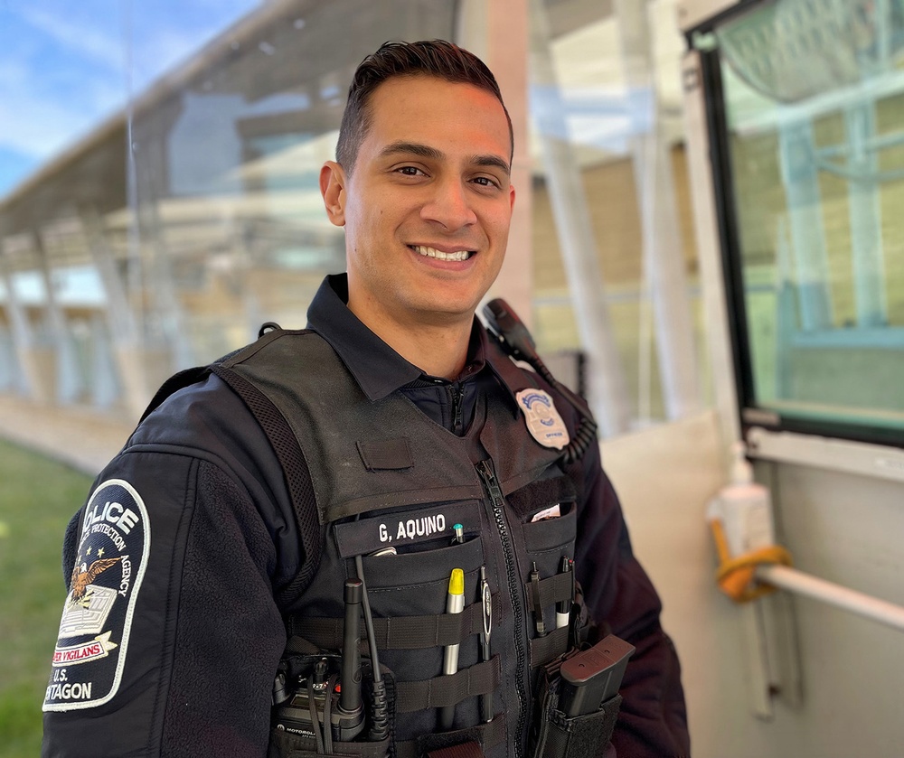 A Pentagon police officer standing near the entrance to the Pentagon
