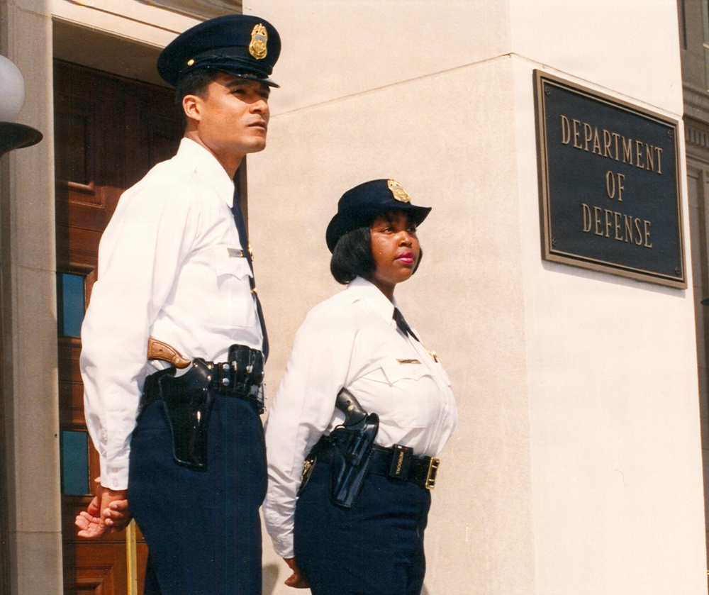 A vintage photo of two Pentagon police officers standing at attention