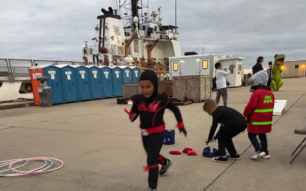 USO Northwest Florida, USCG Cutter Diligence Host Trunk-or-Treat Onboard NAS Pensacola for Naval Station Guantanamo Bay Non-Mission Essential Personnel