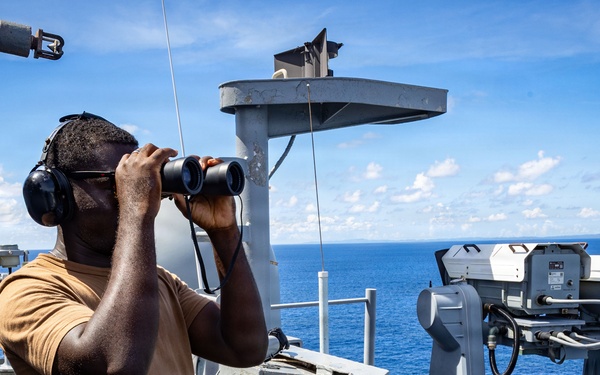USS Iwo Jima Sailors Main Their Posts
