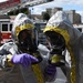 CBRN professionals in safe suits